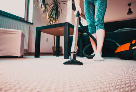 vacuum cleaning at home low angleの写真素材