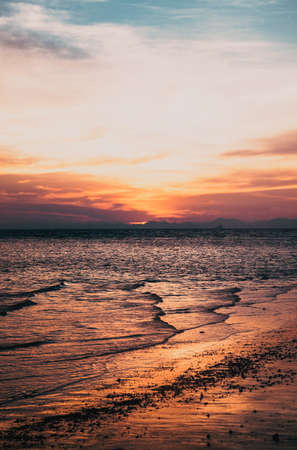 amazing sunset at the beach summer holiday background