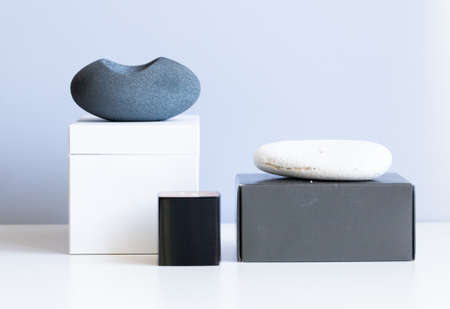 cosmetic product mock up with white boxes and vase