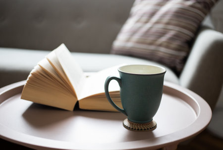 open book on a living room tableの写真素材