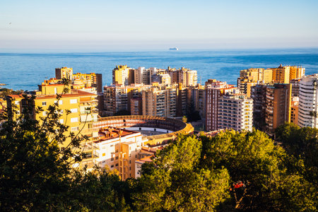 view over Malaga at sunset travel bannerの写真素材