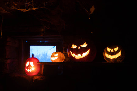 scary Halloween background with Jack'o'lanterns and skeletonの写真素材