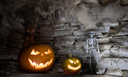 scary Halloween background with Jack'o'lanterns and skeletonの写真素材
