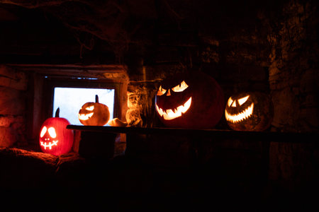 scary Halloween background with Jack'o'lanterns and skeletonの写真素材