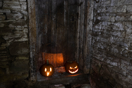 scary Halloween background with Jack'o'lanterns and skeletonの写真素材