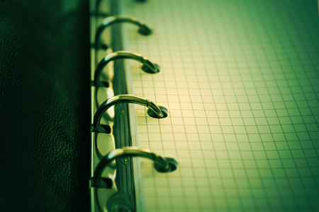 Notebook, spiral notepad macro, close up. Selective focus. Toned.の写真素材