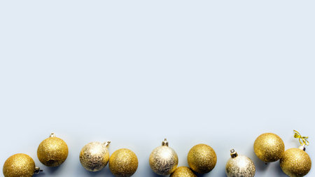 Christmas silver and golden decorations on white background. Christmas composition. Flat lay, top...