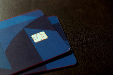 Multiple credit cards a dark background. Selective focus. Concept - Finance, business, cashless payment.の写真素材