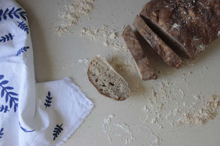 Sliced sourdough bread with blue and white cloth