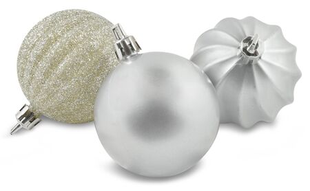 Festive silver and gold Christmas ornaments isolated on white background. Features a clipping path for ease of use.の写真素材