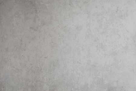 Aged gray concrete background texture with a retro grunge vibe.の写真素材