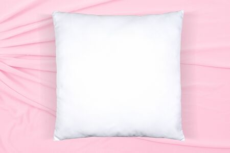 This pretty mock up features a square white throw pillow relaxing on a flowing pink background. Plenty of copy space to add your own design to the throw pillow.の写真素材
