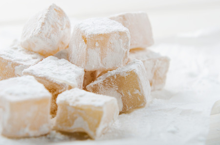 oriental sweets powdered sugar on paper for bakingの写真素材