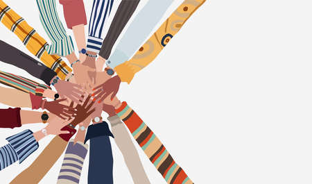 Group of hands on top of each other in a circle of people of diverse culture and race. Cooperation...