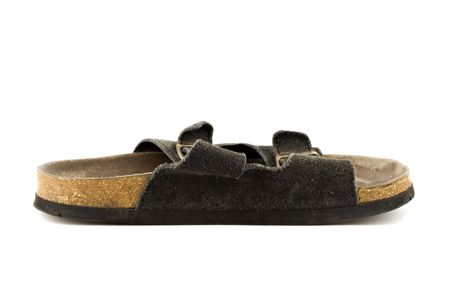 Old grungy sandal isolated on white backgroundの写真素材