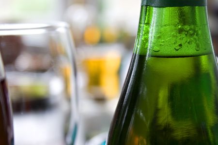 Close up picture of bottle of beer and glassの写真素材