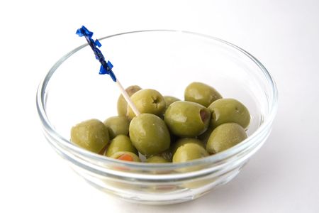 Bowl of Green Olives on whiteの写真素材