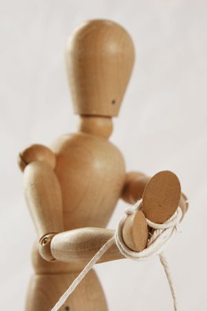 Woody all tied up with rope around his handsの写真素材