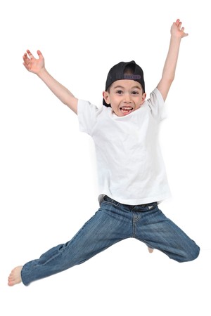 Little boy jumping on isolated white background の写真素材