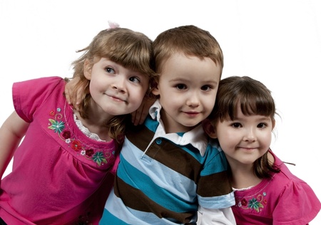 Three Adorable little kids isolated on white background の写真素材