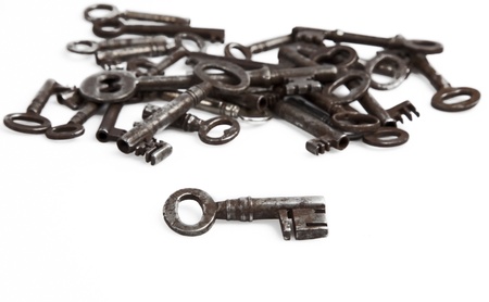 Old Vintage key on white background の写真素材