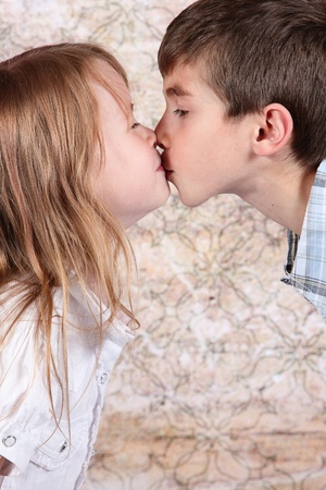 boy and girl kissing each other - closeupの写真素材