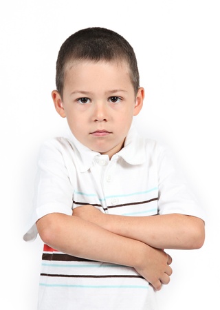 Little boy posing with smile on whiteの写真素材