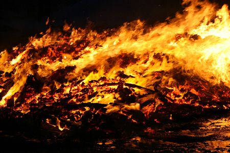 Fire and flames on a black background - taken at night