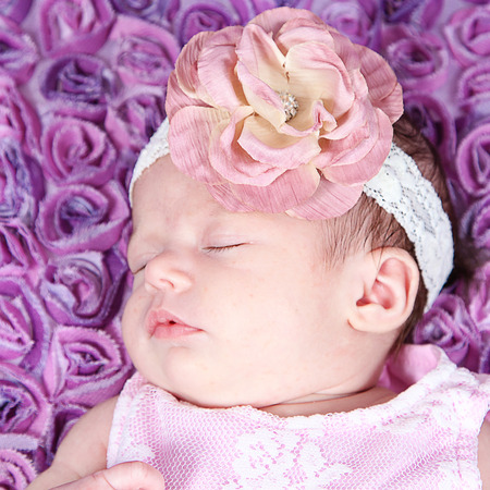 Adorable little girl on backgroundの写真素材