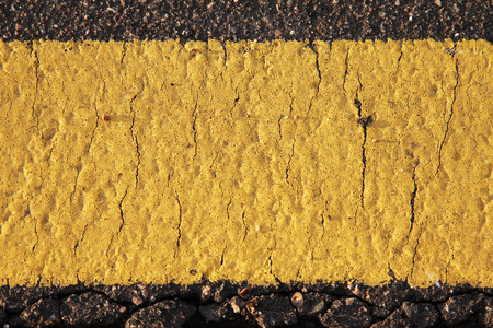 Yellow road mark texture close upの写真素材