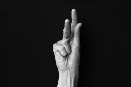 Sign laguage alphabet letter Kの写真素材