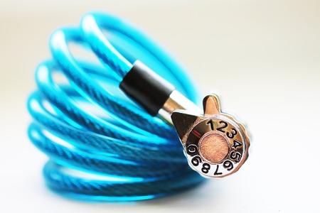 Blue lock for bike or luggage close up macro photoの写真素材