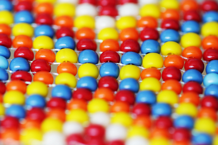 Bracelet made of colorful beads close up macro pattern