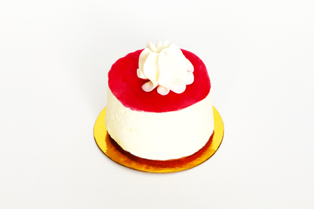 Beautiful small cake on white backgroundの写真素材