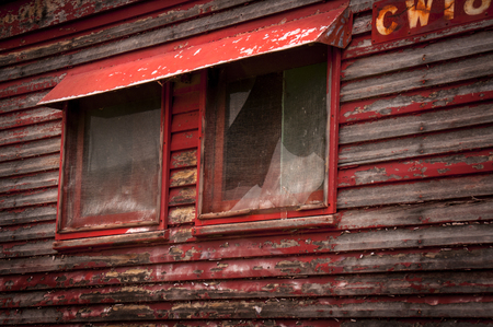 Peeling paint around a window on an abandoned train in Queenslandのeditorial素材