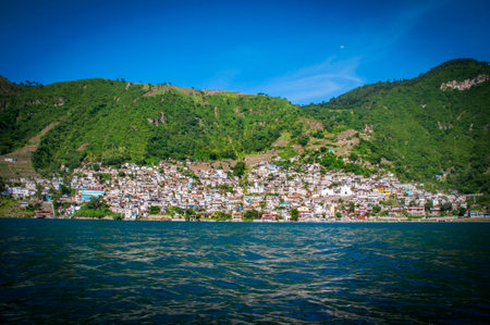 Crowded town by a lake in Guatemalaの写真素材