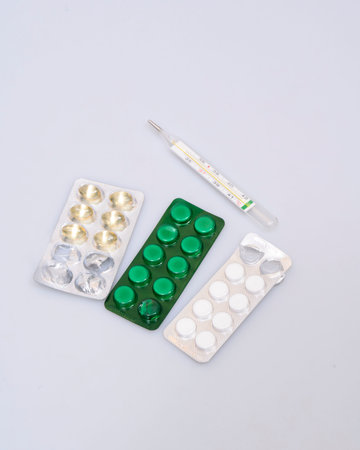 pharmaceutical in various dosage forms on a beige. the diversity of medication forms and the for...