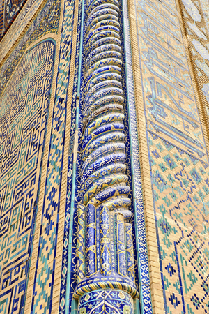 Geometric decoration architecture. Detail of mosaic of ceramic tiles in Registan Square. Samarkand, Uzbekistan.のeditorial素材