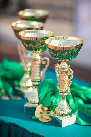 Victorious cups in sports meets. Cups of winners. Trophy cups.の写真素材