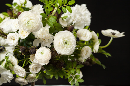 Flower composition on a black background. Bouquet from spring flowers. Wedding bouquet.の写真素材