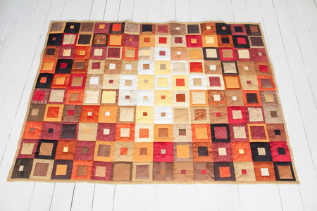 Patchwork quilt. Part of patchwork quilt as background. Handmade.