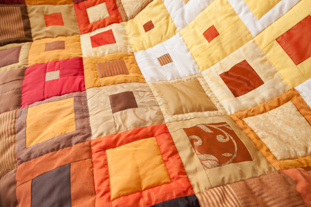 Patchwork quilt. Part of patchwork quilt as background. Handmade.