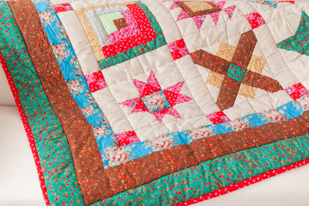 Patchwork quilt. Part of patchwork quilt as background. Handmade.