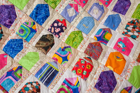 Patchwork quilt. Part of patchwork quilt as background. A blanket in style patchwork. Color blanket....