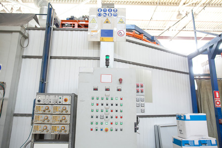 operating console of the modern powerful metal cutting laser mashine at factory. Modern production...