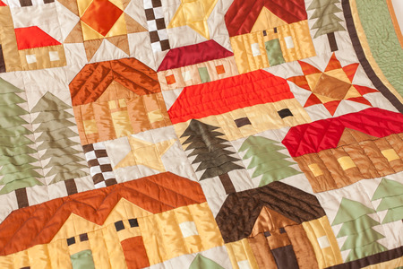 Patchwork quilt. Part of blanket as background.の写真素材