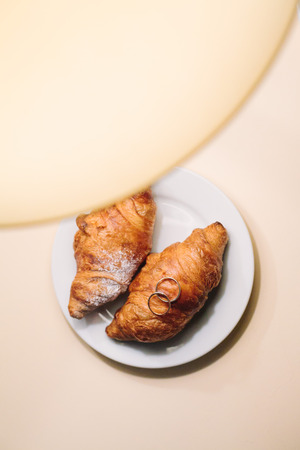 wedding rings on croissant. engagement. St. Valentines Dayの写真素材