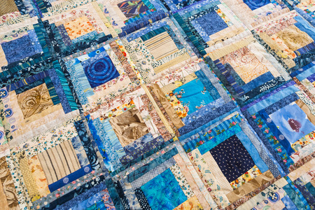 design, interior, housekeeping concept. part of ornament performed on blanket from scrapes of various cotton bits eahs one of them has stand-alone shade and shapeの写真素材