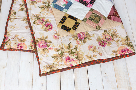 linens, warm, rest concept. pair of little hand maded blankets with flowery print decorated by...