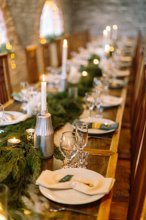 handmade, decoration, cosiness concept. amount of tables served for great feast with snowy white...